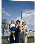 1960s Portrait Family Standing Together In Front Of Church Outdoor by Anonymous