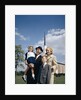 1960s Portrait Family Standing Together In Front Of Church Outdoor by Anonymous