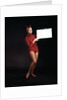 1960s Young Woman In Red Devil Costume Holding Sign Board In Hands by Anonymous