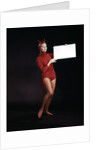 1960s Young Woman In Red Devil Costume Holding Sign Board In Hands by Anonymous