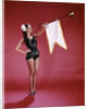 1960s Young Woman In Sequined Black Swimsuit Blowing Baroque Trumpet With Pennant by Anonymous