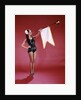 1960s Young Woman In Sequined Black Swimsuit Blowing Baroque Trumpet With Pennant by Anonymous