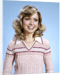 1970s Portrait Curly Woman Wearing Pink Stripe Sweater by Anonymous