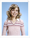 1970s Portrait Curly Woman Wearing Pink Stripe Sweater by Anonymous