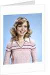 1970s Portrait Curly Woman Wearing Pink Stripe Sweater by Anonymous