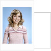 1970s Portrait Curly Woman Wearing Pink Stripe Sweater by Anonymous