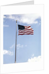 1960s American Flag On Pole Flying Against Blue Sky With Clouds by Anonymous