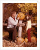 1960s Man Father And Girl Daughter Carving Halloween Jack-O-Lantern Pumpkin by Anonymous
