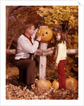 1960s Man Father And Girl Daughter Carving Halloween Jack-O-Lantern Pumpkin by Anonymous