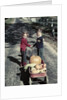 1950s Kids In Blue Jeans Pulling Red Wagon Full Of Pumpkins by Anonymous
