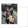 1950s Kids In Blue Jeans Pulling Red Wagon Full Of Pumpkins by Anonymous