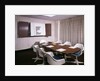 1960s Office Conference Room With Table Chairs Writing Pads Ashtray And Wall Chart by Anonymous