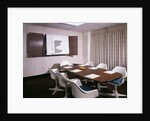 1960s Office Conference Room With Table Chairs Writing Pads Ashtray And Wall Chart by Anonymous