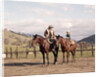 1970s Father And Son Sitting Together On Horses By Corral Wearing Hats by Anonymous