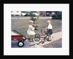 1950s Little Girl Sister Holding Doll Watching Little Boy Brother Repair Tricycle by Anonymous