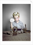 1950s Funny Curious Little Boy Holding Pliers Tool Taking Apart An Alarm Clock by Anonymous