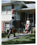 1950s Woman and Daughter Waiting At Front Steps For Man Coming Home by Anonymous