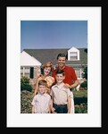 1960s Portrait Family Father Mother Two Sons Standing Together In Front Of Suburban House by Anonymous