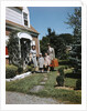 1940s 1950s Family Father Mother Daughter Son Leaving Suburban House Carrying Luggage by Anonymous