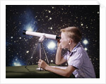 1960s Composite Boy With Telescope On Table Looking At Night Sky With Stars Galaxy Nebula by Anonymous