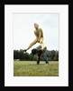 1970s Two Boys Jumping Playing Leapfrog by Corbis