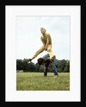 1970s Two Boys Jumping Playing Leapfrog by Anonymous