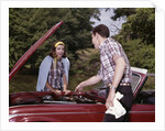 1960s Couple By Car With Hood Up Looking At Motor Outdoor Problem Breakdown by Anonymous