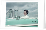 Woman driving 1956 Chevrolet Bel Air Convertible by Anonymous