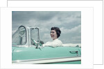 Woman driving 1956 Chevrolet Bel Air Convertible by Anonymous