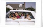 1960s Father And Mother With Son And Daughter Sitting In White Four Door Sedan Automobile by Anonymous