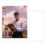 1950s 1960s Mechanic Holding Check List On Clipboard by Anonymous