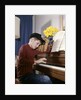1960s 1970s Impatient Annoyed Looking Boy With Baseball Cap And Glove Practicing Piano Lesson by Anonymous