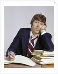 1970s Business Man Exhausted Expression Hand To Face Leaning On Pile Paperwork by Anonymous