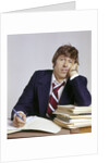 1970s Business Man Exhausted Expression Hand To Face Leaning On Pile Paperwork by Anonymous