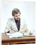 1970s Business Man At Desk Handling Paperwork Office Telephone by Anonymous