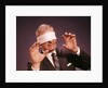 1960s Blindfolded Senior Man Businessman Arms Reaching Grasping Feeling Way by Anonymous