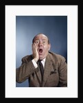 1960s Balding Businessman Holding Hand Up To Face Shocked Expression Eyes Bulging Mouth Open by Anonymous