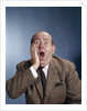 1960s Balding Businessman Holding Hand Up To Face Shocked Expression Eyes Bulging Mouth Open by Anonymous