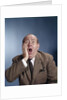 1960s Balding Businessman Holding Hand Up To Face Shocked Expression Eyes Bulging Mouth Open by Anonymous