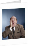 1960s Balding Businessman Holding Hand Up To Face Shocked Expression Eyes Bulging Mouth Open by Anonymous