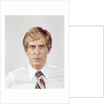 1970s Portrait Of Intense Businessman Salesman In Shirt Sleeves Looking At Camera by Corbis