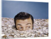 1960s Top Of Head And Eyes Of Man Looking Out From Pile Of Coins Studio Symbolic Currency by Anonymous