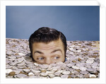1960s Top Of Head And Eyes Of Man Looking Out From Pile Of Coins Studio Symbolic Currency by Anonymous