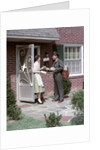 1950s Mailman Delivering Mail To Woman Brick Suburban Home by Anonymous