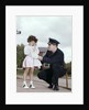 1960s Man Police Officer Comforting Crying Scared Little Lost Girl In Suburban Neighborhood by Anonymous