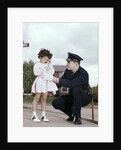 1960s Man Police Officer Comforting Crying Scared Little Lost Girl In Suburban Neighborhood by Anonymous