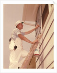 1950s 1960s Man House Painter Up Ladder Painting Window Shutter by Anonymous