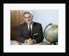 1960s Portrait Man Businessman Sitting At Desk Next To Globe Of The Earth by Anonymous