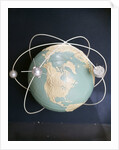 1950s 1960s Model Of Satellites Orbiting The Globe by Anonymous