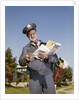 1960s Mailman Holding Letters Mail Leather Mailbag In Suburban Neighborhood by Anonymous